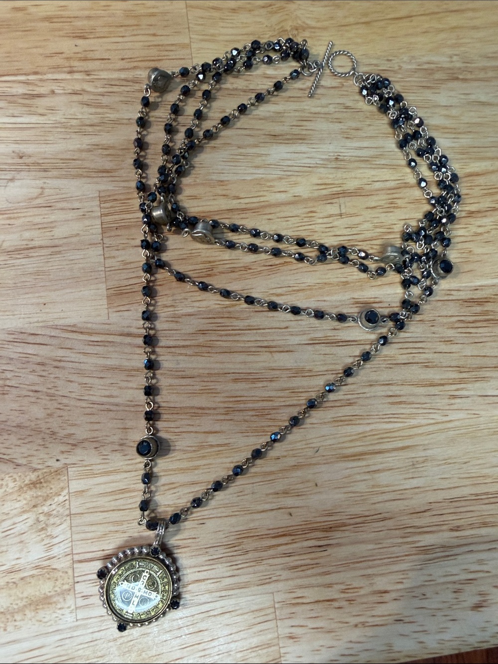 Virgins Saints & Angels Black and Gold Layered Medallion Necklace